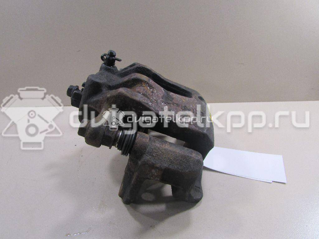 Фото Суппорт тормозной передний левый  581801RA00 для Hyundai I20 {forloop.counter}}