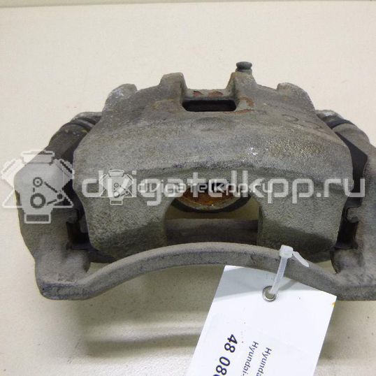 Фото Суппорт тормозной передний левый  581801RA00 для Hyundai I20