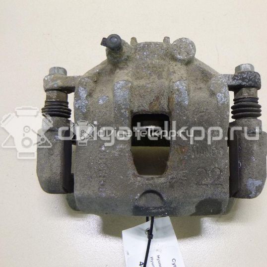 Фото Суппорт тормозной передний правый  581901RA00 для Hyundai I20