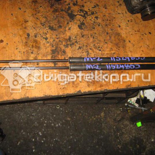 Фото Амортизатор двери багажника  DD1062620 для Mazda 2