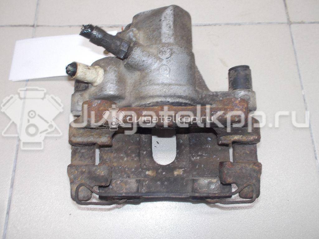 Фото Суппорт тормозной задний правый  1365648 для mazda Mazda 3 (BK) {forloop.counter}}