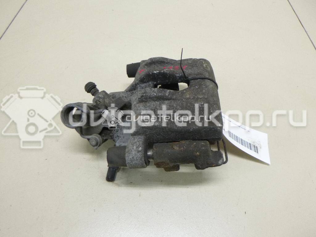 Фото Суппорт тормозной задний левый  1365653 для mazda Mazda 3 (BK) {forloop.counter}}