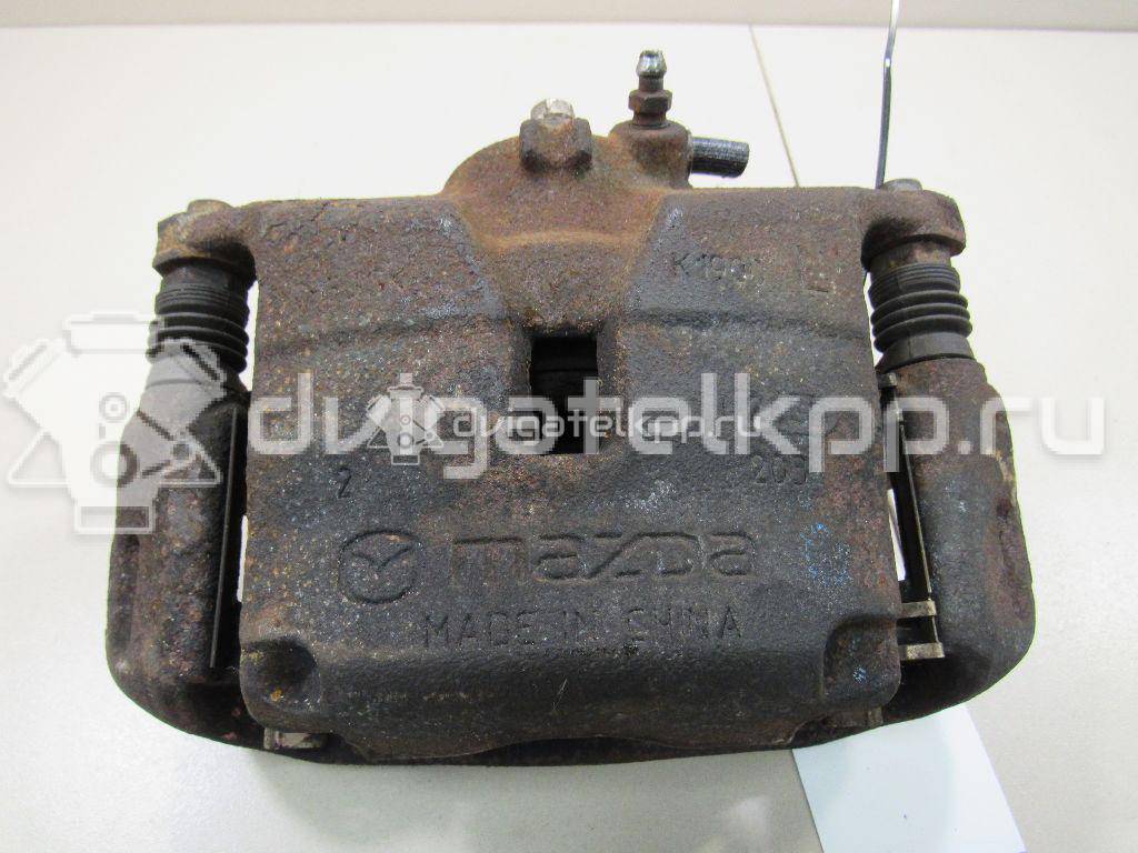 Фото Суппорт тормозной передний левый  B4Y03399ZB для Mazda Cx-3 Dk / 3 {forloop.counter}}