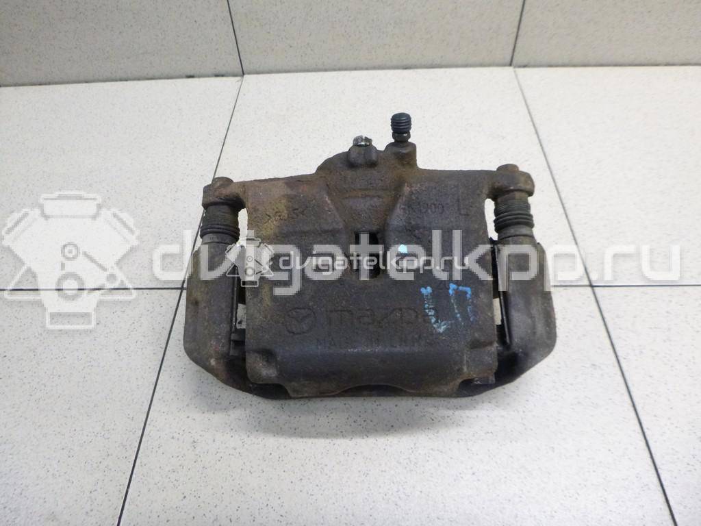 Фото Суппорт тормозной передний левый  B4Y03399ZB для Mazda Cx-3 Dk / 3 {forloop.counter}}