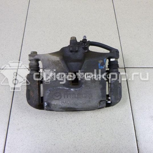 Фото Суппорт тормозной передний левый  B4Y03399ZB для Mazda Cx-3 Dk / 3