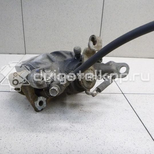 Фото Суппорт тормозной задний левый  B4Y72699ZA для Mazda 3