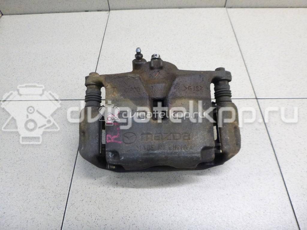 Фото Суппорт тормозной передний правый  B4Y03398ZB для Mazda Cx-3 Dk / 3 {forloop.counter}}