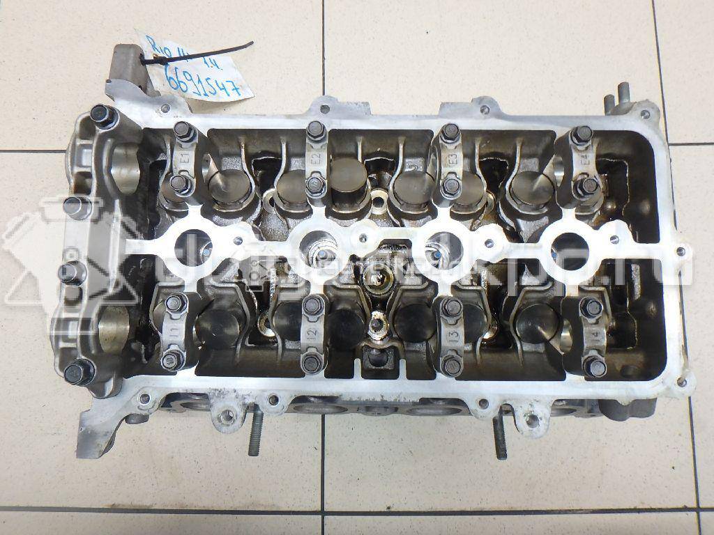 Фото Головка блока для двигателя G4FC для Hyundai / Kia 114-132 л.с 16V 1.6 л Бензин/спирт 221002B002 {forloop.counter}}