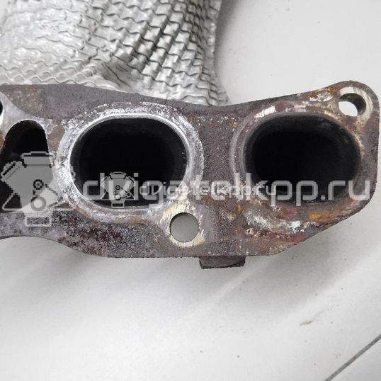 Фото Коллектор выпускной для двигателя QR25DE для Nissan (Dongfeng) / Suzuki / Mitsuoka / Nissan 141-182 л.с 16V 2.5 л бензин 140E23TA0A