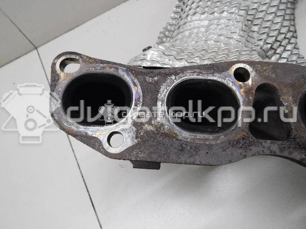 Фото Коллектор выпускной для двигателя QR25DE для Nissan (Dongfeng) / Suzuki / Mitsuoka / Nissan 141-182 л.с 16V 2.5 л бензин 140E23TA0A {forloop.counter}}