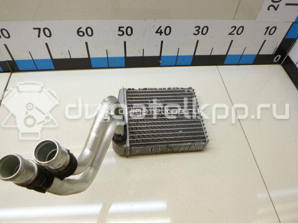 Фото Радиатор отопителя  27140AX70A для Nissan Note / Nv200 / Micra {forloop.counter}}