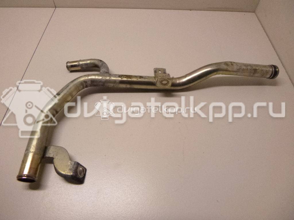 Фото Трубка системы охлаждения  13049AX00A для Nissan Note / Micra {forloop.counter}}