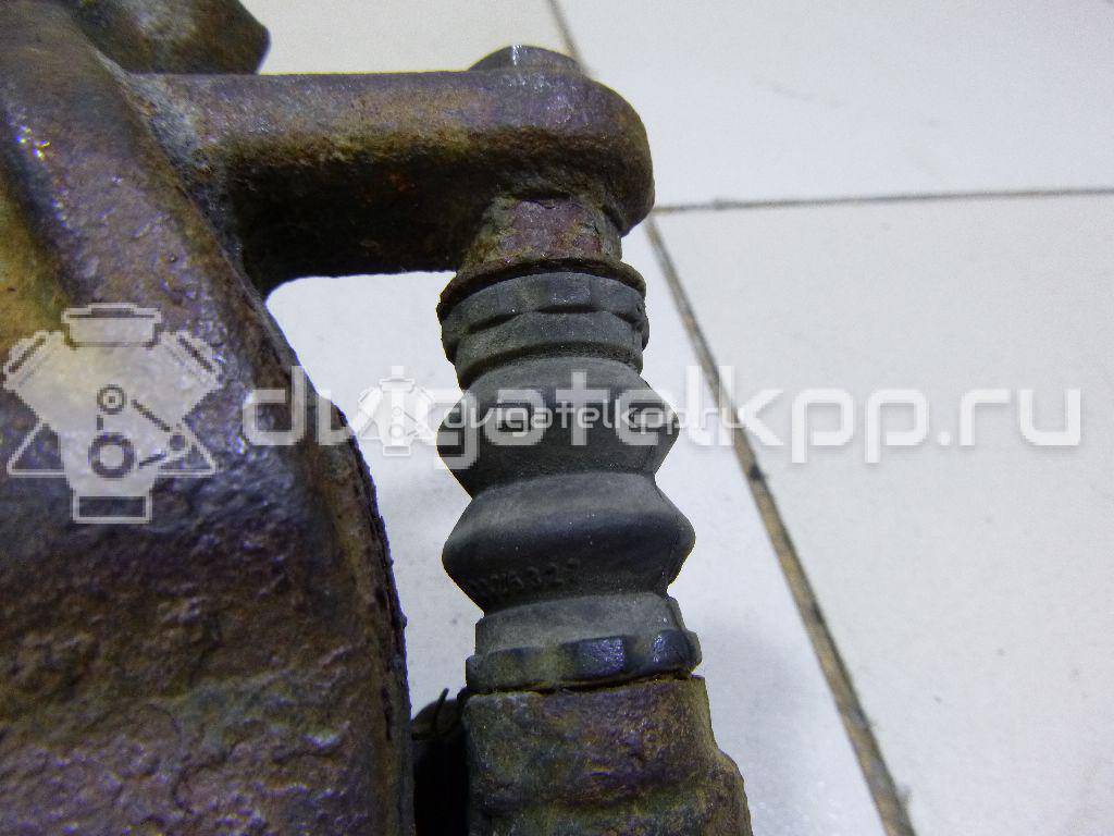Фото Суппорт тормозной передний левый  41011AX60A для Nissan Note / Micra {forloop.counter}}