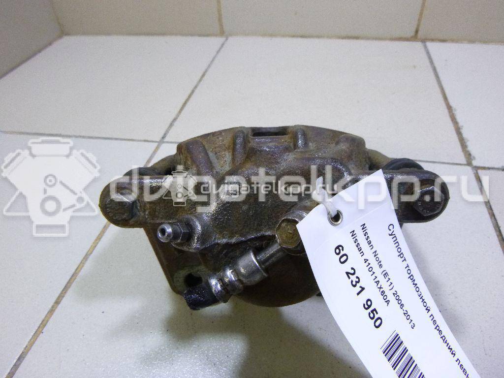 Фото Суппорт тормозной передний левый  41011AX60A для Nissan Note / Micra {forloop.counter}}