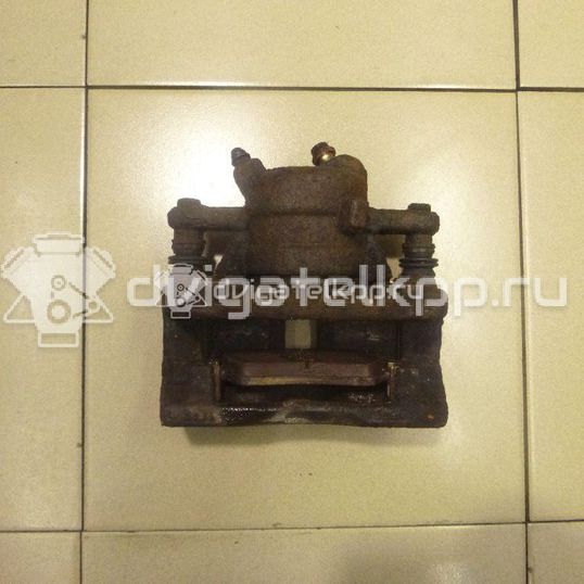 Фото Суппорт тормозной передний левый  41011AX60A для Nissan Note / Micra