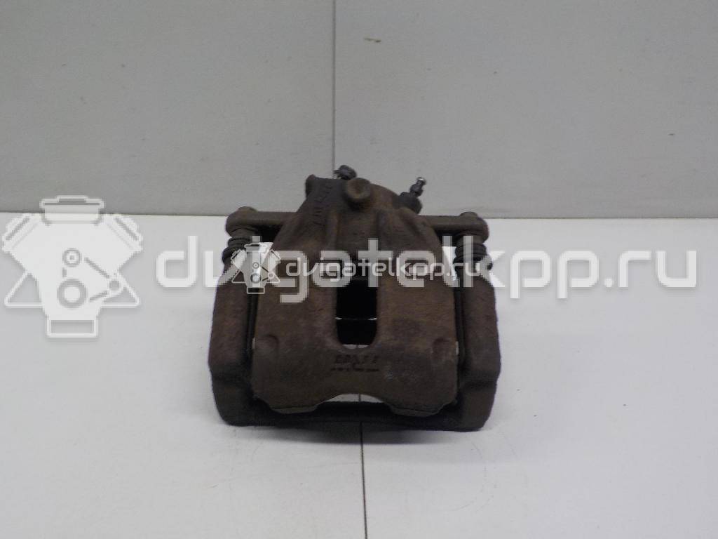 Фото Суппорт тормозной передний левый  41011AX60A для Nissan Note / Micra {forloop.counter}}