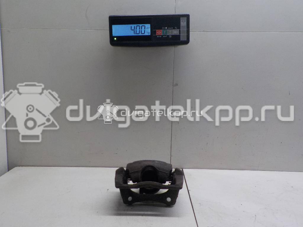 Фото Суппорт тормозной передний левый  41011AX60A для Nissan Note / Micra {forloop.counter}}