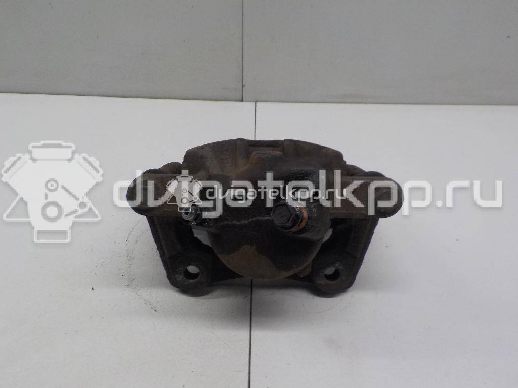 Фото Суппорт тормозной передний левый  41011AX60A для Nissan Note / Micra {forloop.counter}}