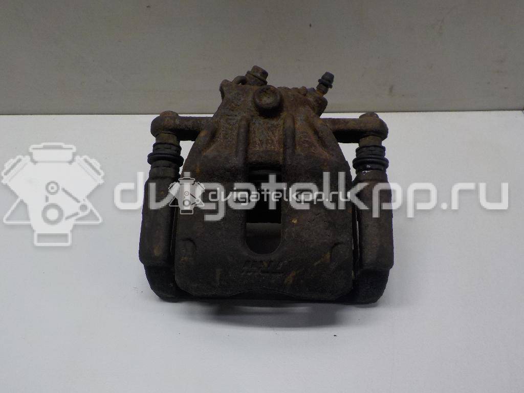 Фото Суппорт тормозной передний левый  41011AX60A для Nissan Note / Micra {forloop.counter}}