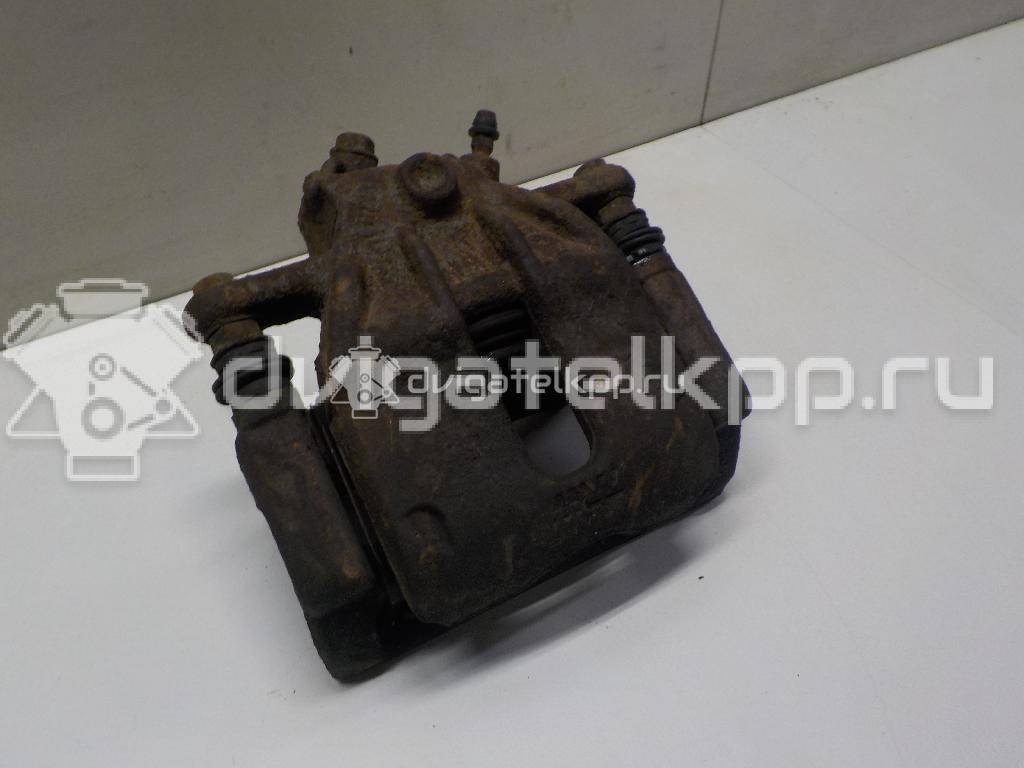 Фото Суппорт тормозной передний левый  41011AX60A для Nissan Note / Micra {forloop.counter}}