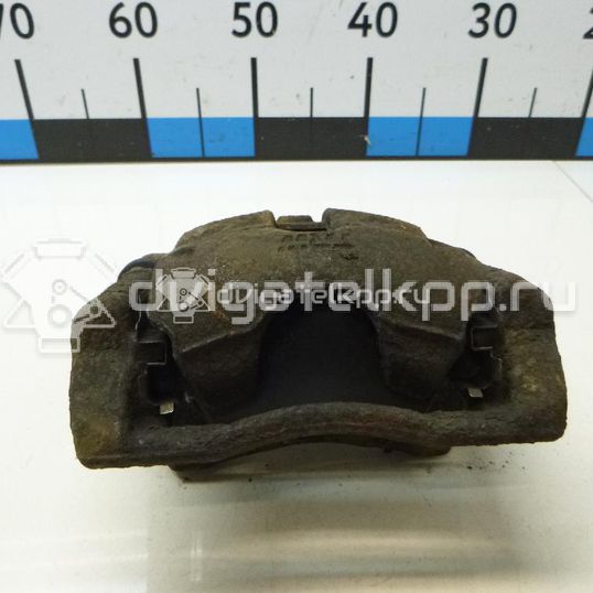 Фото Суппорт тормозной передний правый  41001AX60A для Nissan Note / Micra