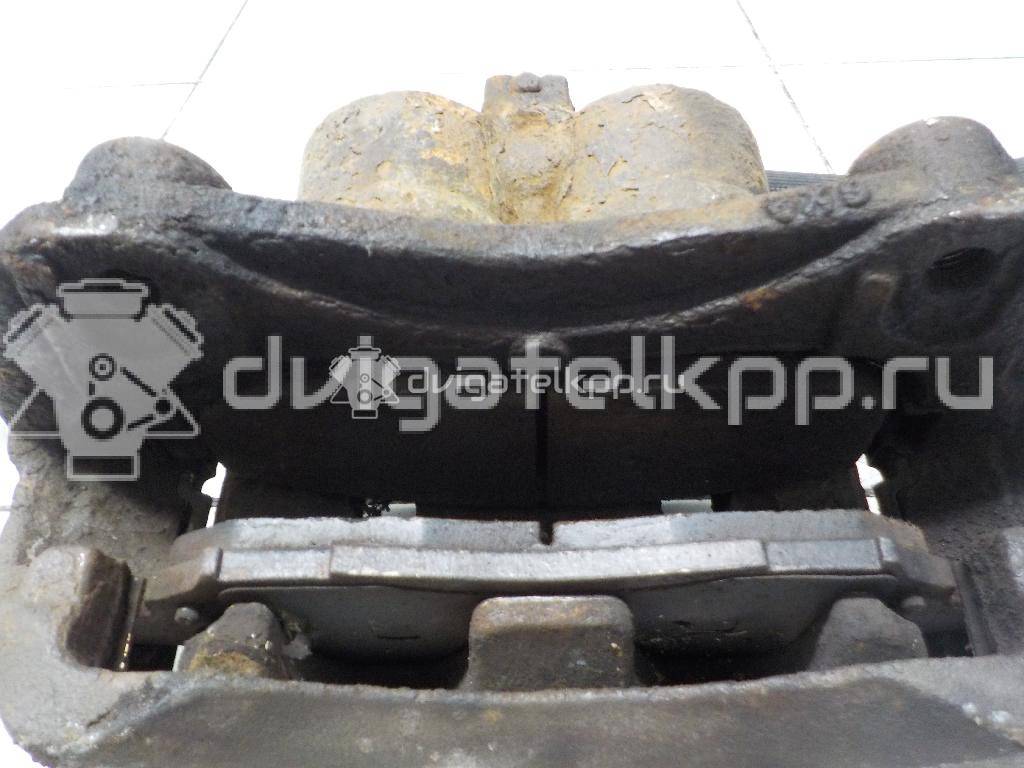 Фото Суппорт тормозной передний левый  41011EB32A для Nissan Navara / Np300 / Pathfinder {forloop.counter}}