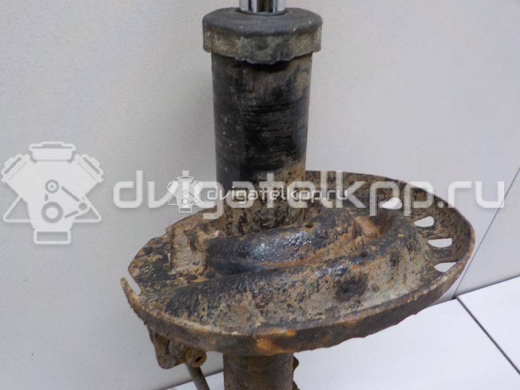 Фото Амортизатор передний правый  E43029U00C для Nissan Note / Micra {forloop.counter}}