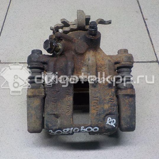 Фото Суппорт тормозной задний правый  44001BM40A для Nissan Primera / Almera