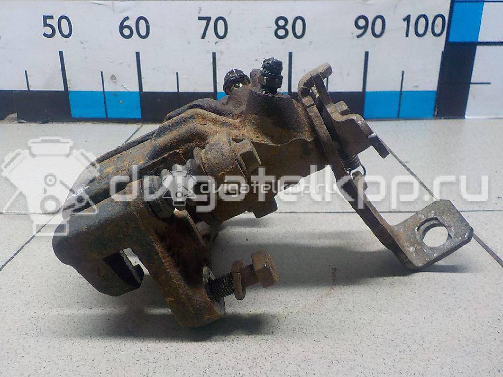 Фото Суппорт тормозной задний правый  44001BM40A для Nissan Primera / Almera {forloop.counter}}