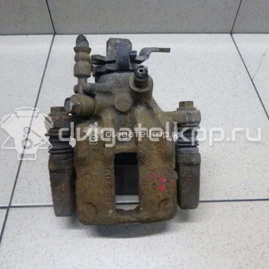 Фото Суппорт тормозной задний правый  44001BM40A для Nissan Primera / Almera