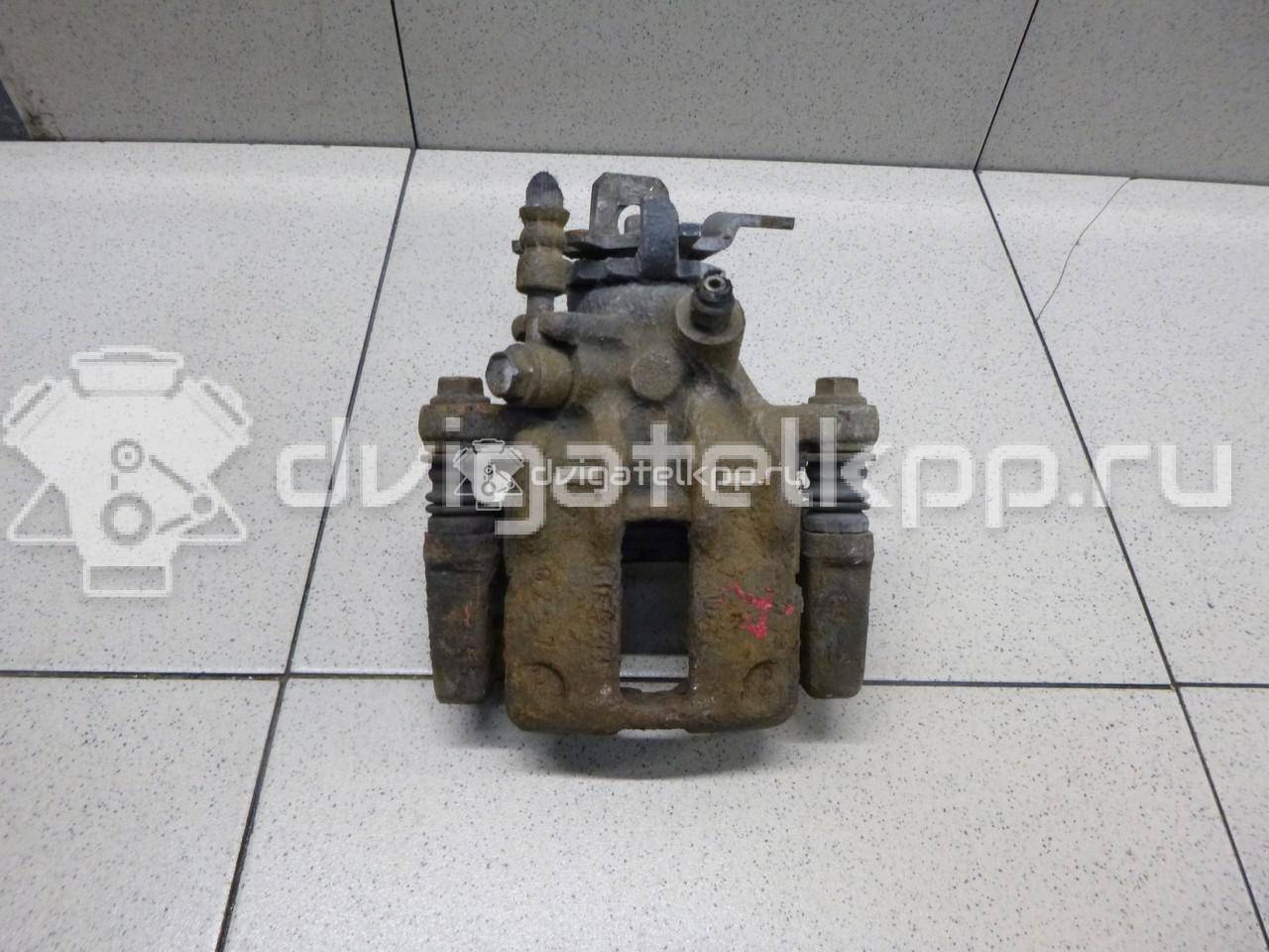 Фото Суппорт тормозной задний правый  44001BM40A для Nissan Primera / Almera {forloop.counter}}