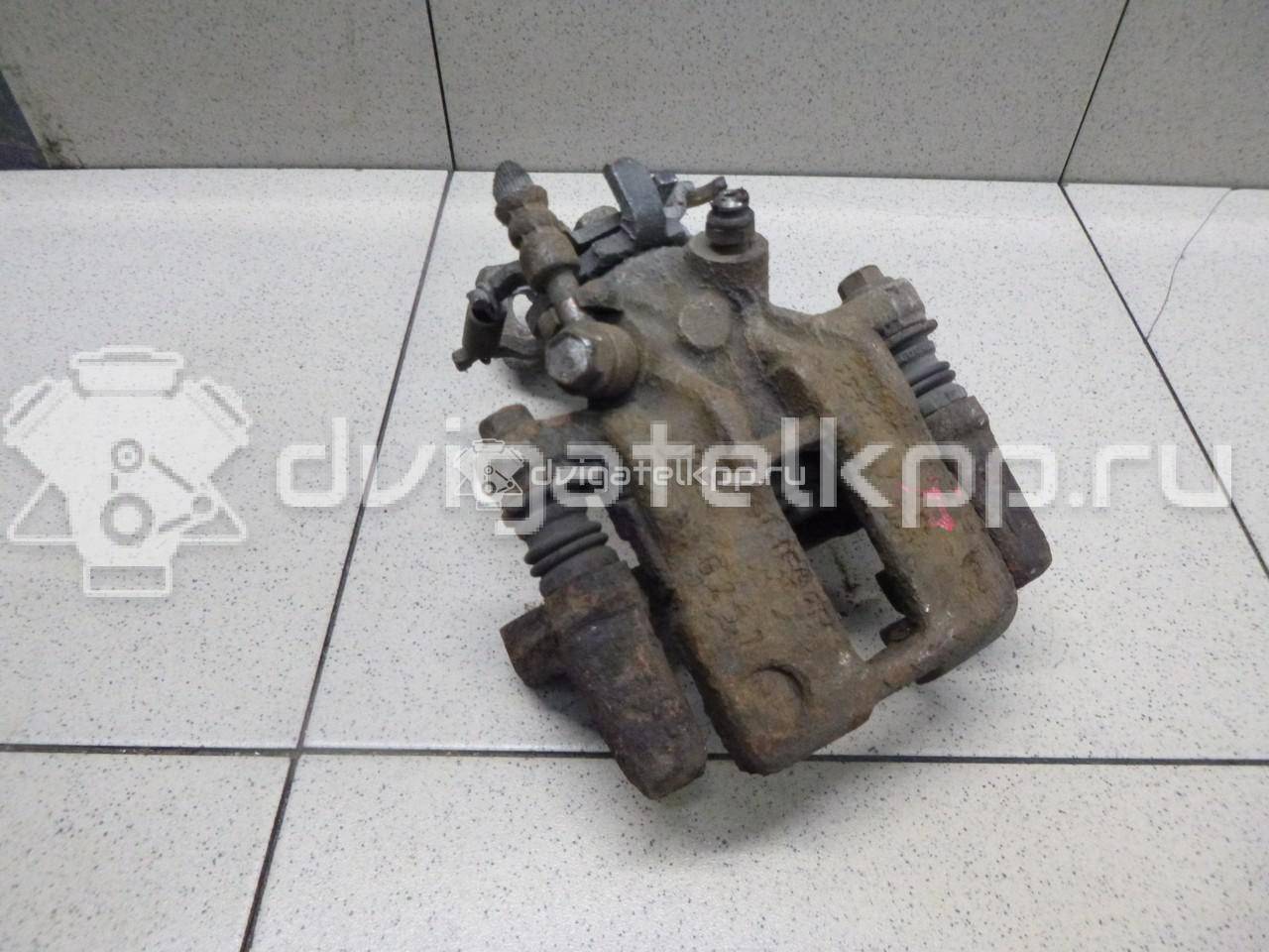 Фото Суппорт тормозной задний правый  44001BM40A для Nissan Primera / Almera {forloop.counter}}