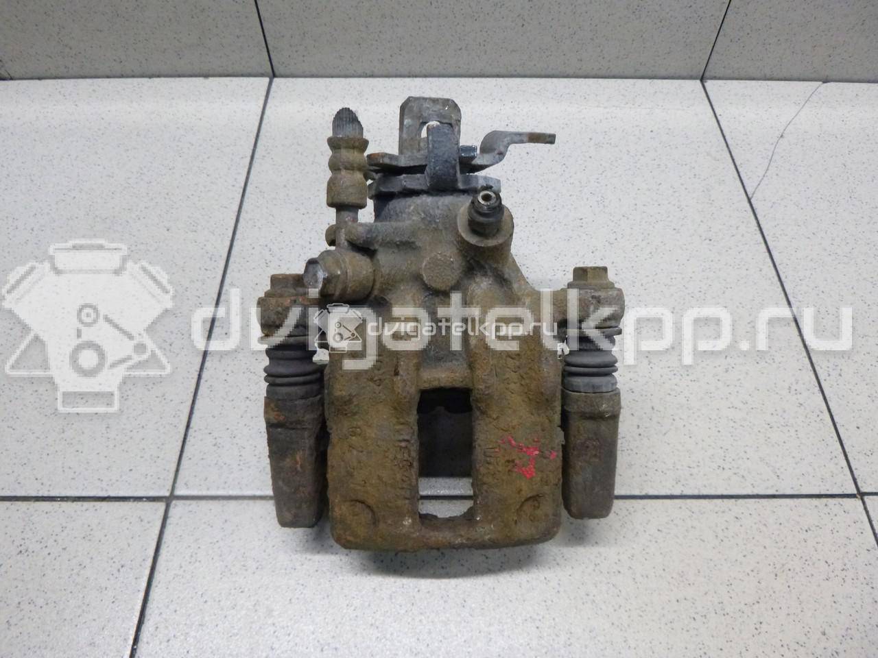 Фото Суппорт тормозной задний правый  44001BM40A для Nissan Primera / Almera {forloop.counter}}