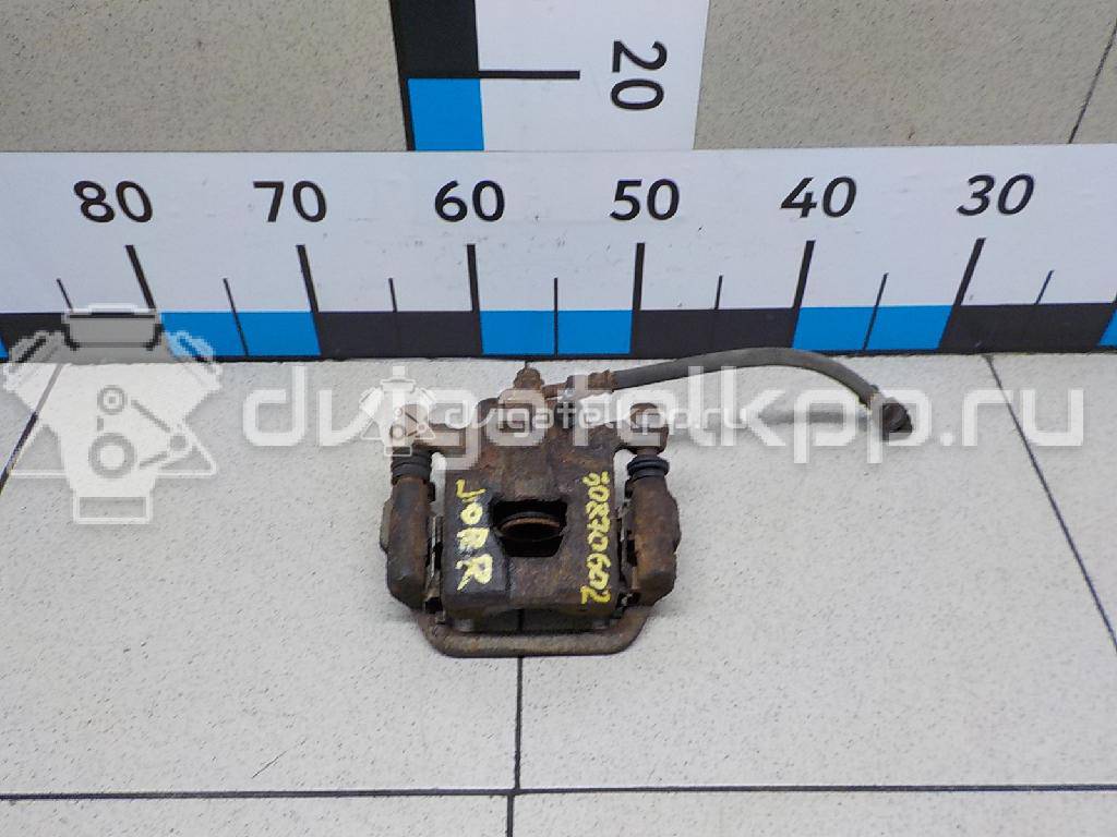 Фото Суппорт тормозной задний правый  44001EM11A для Nissan Tiida / Qashqai / Cube Z12 / Juke F15 / Pulsar C13 {forloop.counter}}