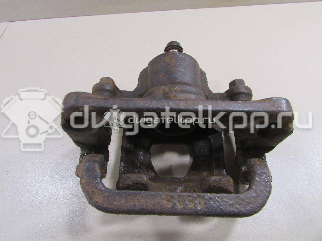Фото Суппорт тормозной задний правый  44001EM11A для Nissan Tiida / Qashqai / Cube Z12 / Juke F15 / Pulsar C13 {forloop.counter}}