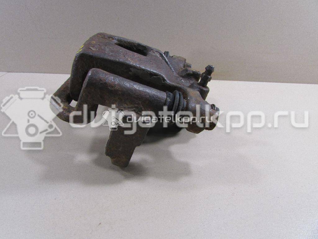 Фото Суппорт тормозной задний правый  44001EM11A для Nissan Tiida / Qashqai / Cube Z12 / Juke F15 / Pulsar C13 {forloop.counter}}