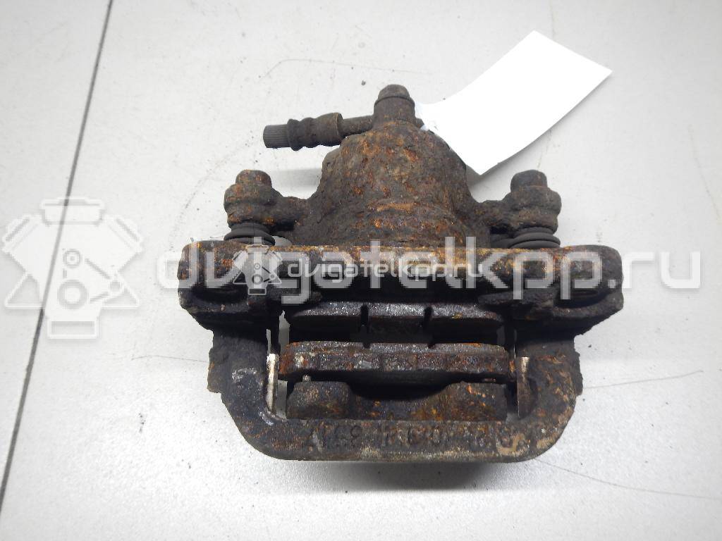 Фото Суппорт тормозной задний правый  44001EM11A для Nissan Tiida / Qashqai / Cube Z12 / Juke F15 / Pulsar C13 {forloop.counter}}