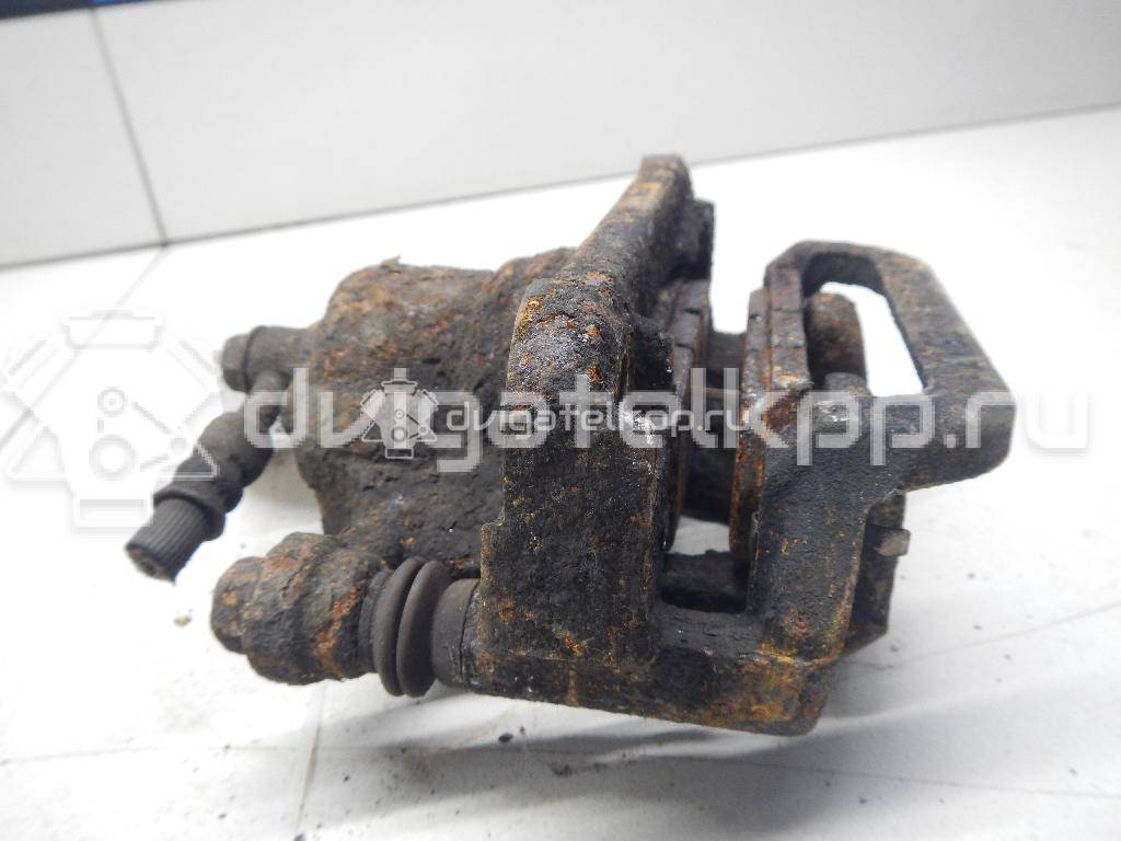 Фото Суппорт тормозной задний правый  44001EM11A для Nissan Tiida / Qashqai / Cube Z12 / Juke F15 / Pulsar C13 {forloop.counter}}