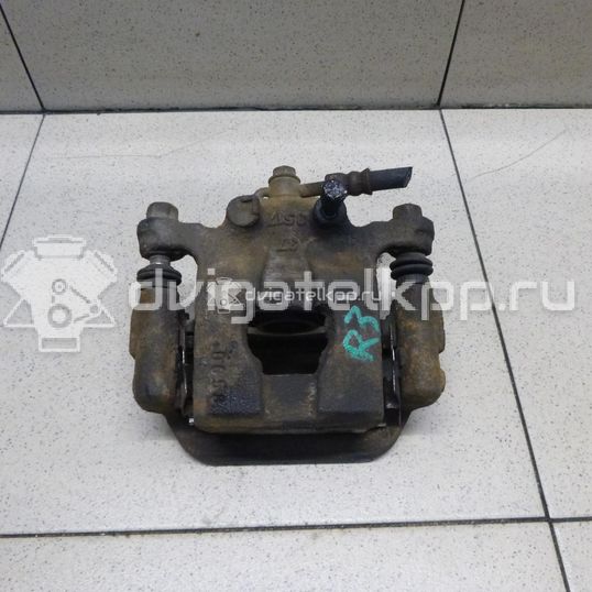 Фото Суппорт тормозной задний правый  44001EM11A для Nissan Tiida / Qashqai / Cube Z12 / Juke F15 / Pulsar C13