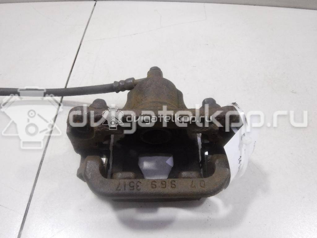 Фото Суппорт тормозной задний правый  44001EM11A для Nissan Tiida / Qashqai / Cube Z12 / Juke F15 / Pulsar C13 {forloop.counter}}