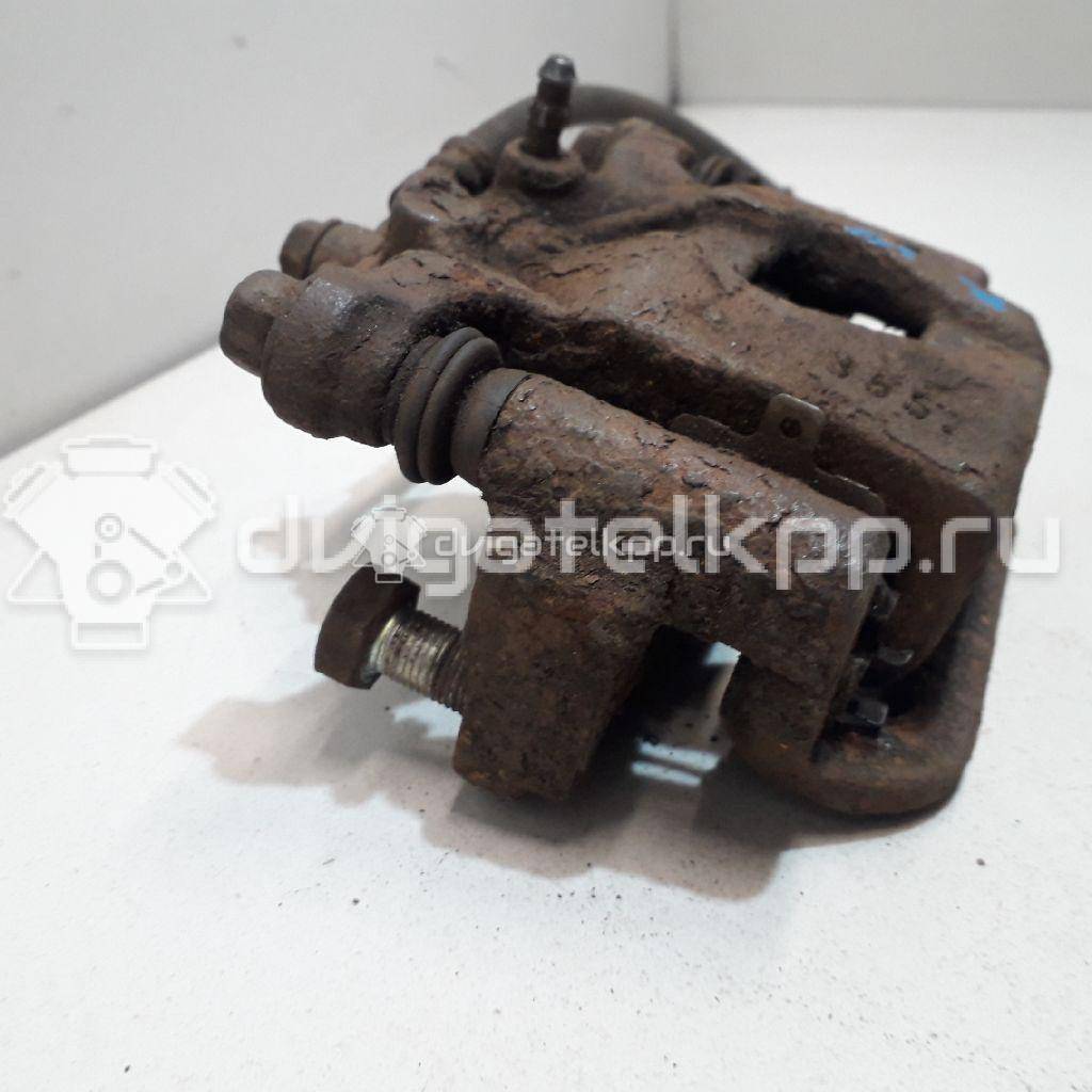 Фото Суппорт тормозной задний правый  44001EM11A для Nissan Tiida / Qashqai / Cube Z12 / Juke F15 / Pulsar C13 {forloop.counter}}