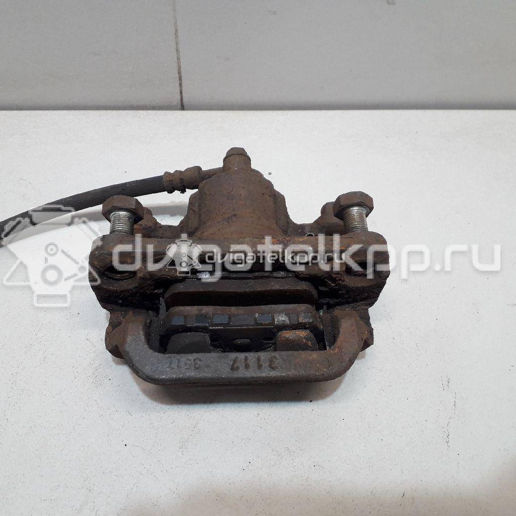 Фото Суппорт тормозной задний правый  44001EM11A для Nissan Tiida / Qashqai / Cube Z12 / Juke F15 / Pulsar C13 {forloop.counter}}