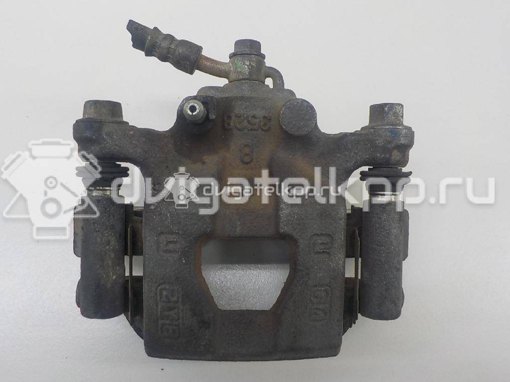 Фото Суппорт тормозной задний правый  440011KD0A для Nissan Tiida / Qashqai / Cube Z12 / Juke F15 / Pulsar C13 {forloop.counter}}