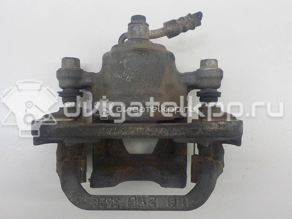 Фото Суппорт тормозной задний правый  440011KD0A для Nissan Tiida / Qashqai / Cube Z12 / Juke F15 / Pulsar C13 {forloop.counter}}