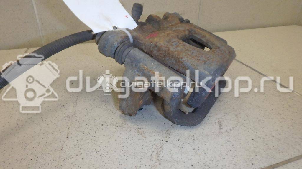 Фото Суппорт тормозной задний правый  440011KD0A для Nissan Tiida / Qashqai / Cube Z12 / Juke F15 / Pulsar C13 {forloop.counter}}
