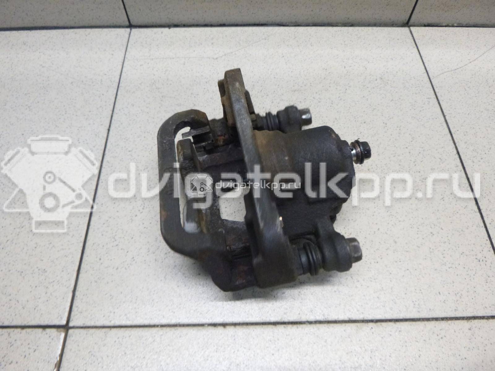 Фото Суппорт тормозной задний левый  44011EM11A для Nissan Teana / Tiida / X-Trail / Qashqai / Cube Z12 {forloop.counter}}