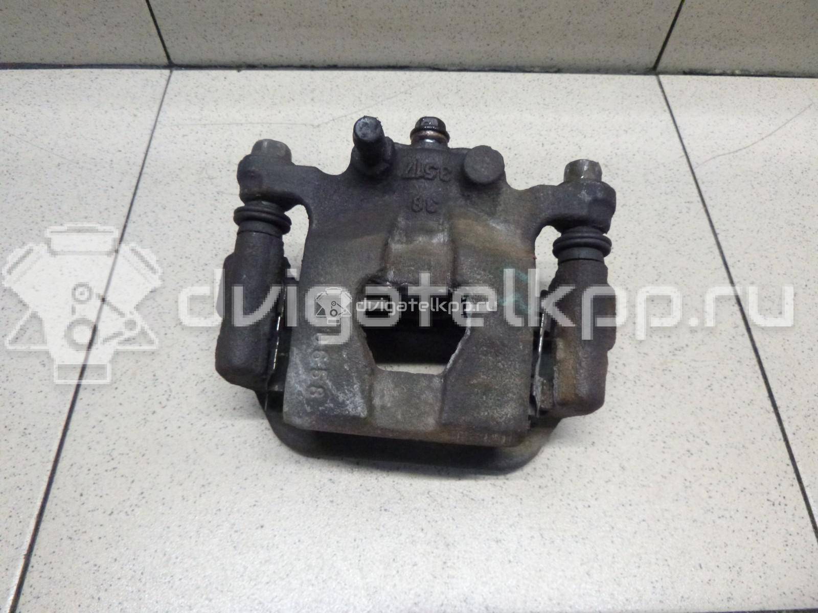 Фото Суппорт тормозной задний левый  44011EM11A для Nissan Teana / Tiida / X-Trail / Qashqai / Cube Z12 {forloop.counter}}