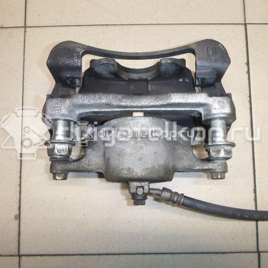 Фото Суппорт тормозной передний левый  410114EA0A для Nissan Qashqai