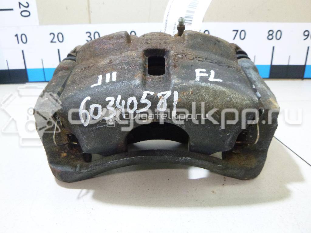 Фото Суппорт тормозной передний левый  410114EA0A для Nissan Qashqai {forloop.counter}}