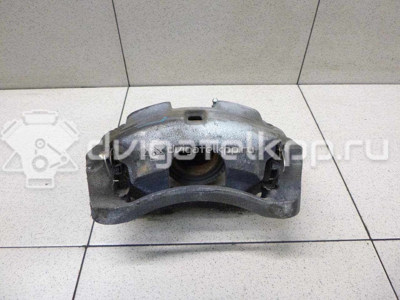 Фото Суппорт тормозной передний левый  410114EA0A для Nissan Qashqai {forloop.counter}}